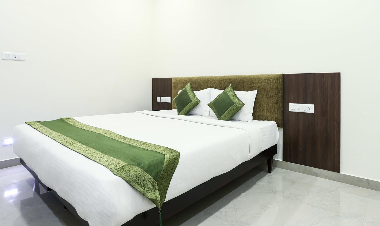 Hotel Cmk Habitat Centre Kochi Exterior foto